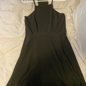 Lulus, black dress. Size medium. Never worn, still has tags